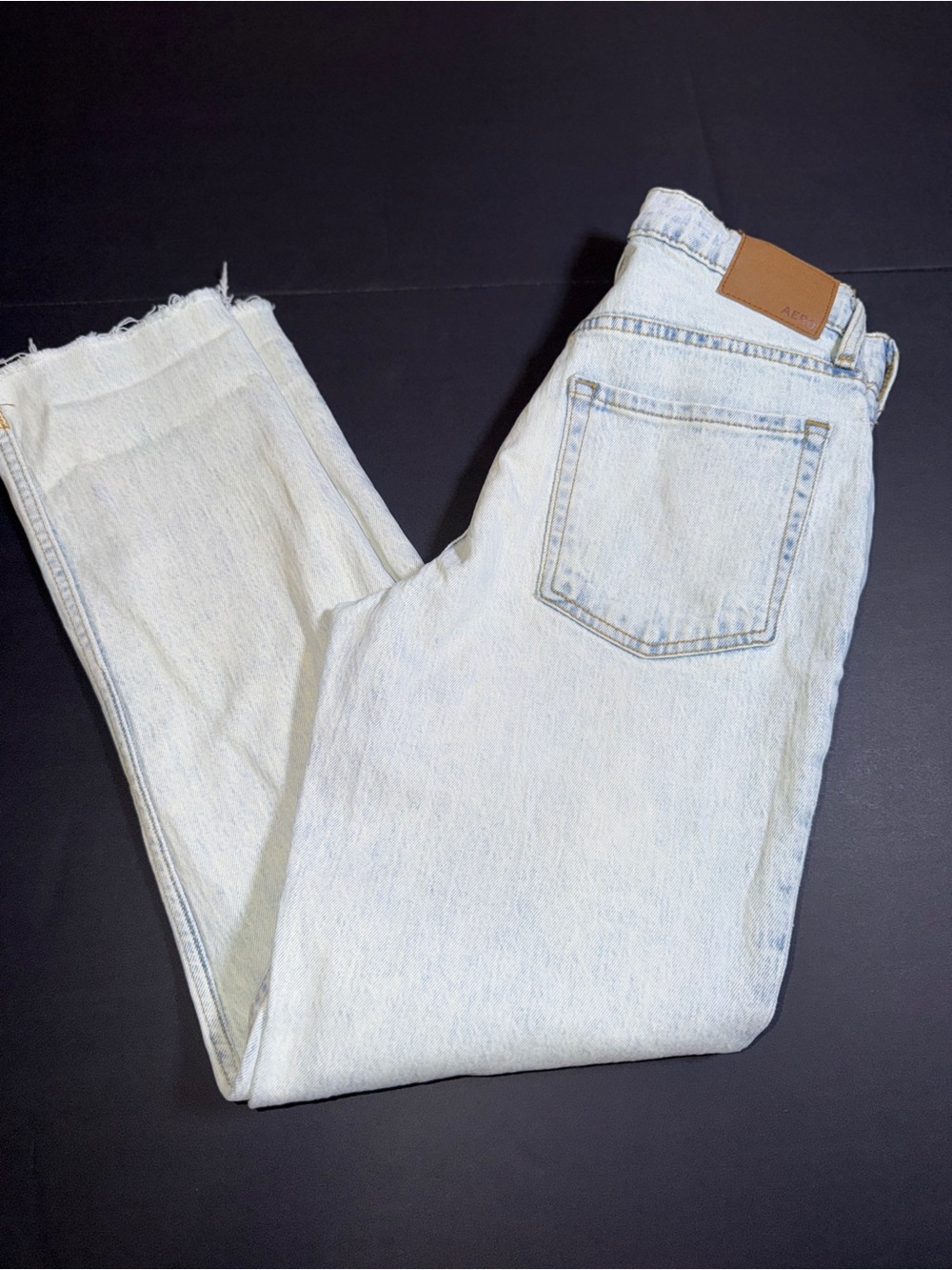 AERO Light Wash High-Rise Jeans with Raw Hem